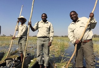 Canoe guides in the Okavango Delta